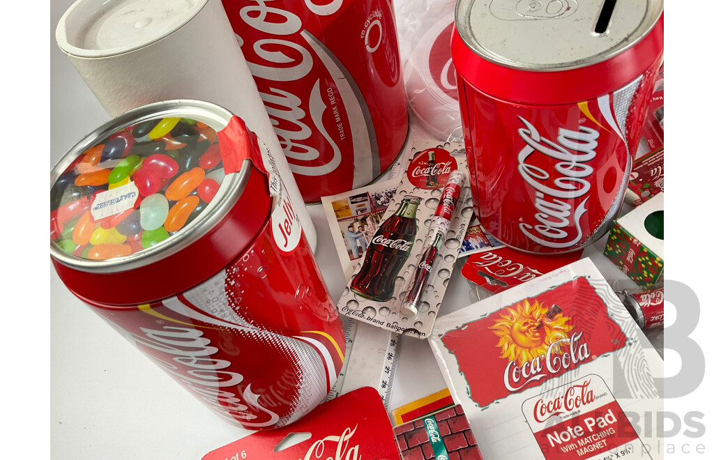 Coca Cola Merchandise Including Vintage Money Tins, Pens, Coasters, Frisbee, Playing Cards, Lip Smackers