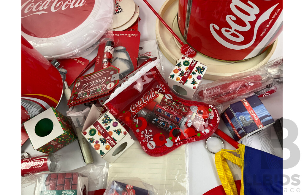 Coca Cola Merchandise Including Vintage Money Tins, Pens, Coasters, Frisbee, Playing Cards, Lip Smackers