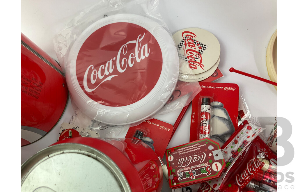 Coca Cola Merchandise Including Vintage Money Tins, Pens, Coasters, Frisbee, Playing Cards, Lip Smackers