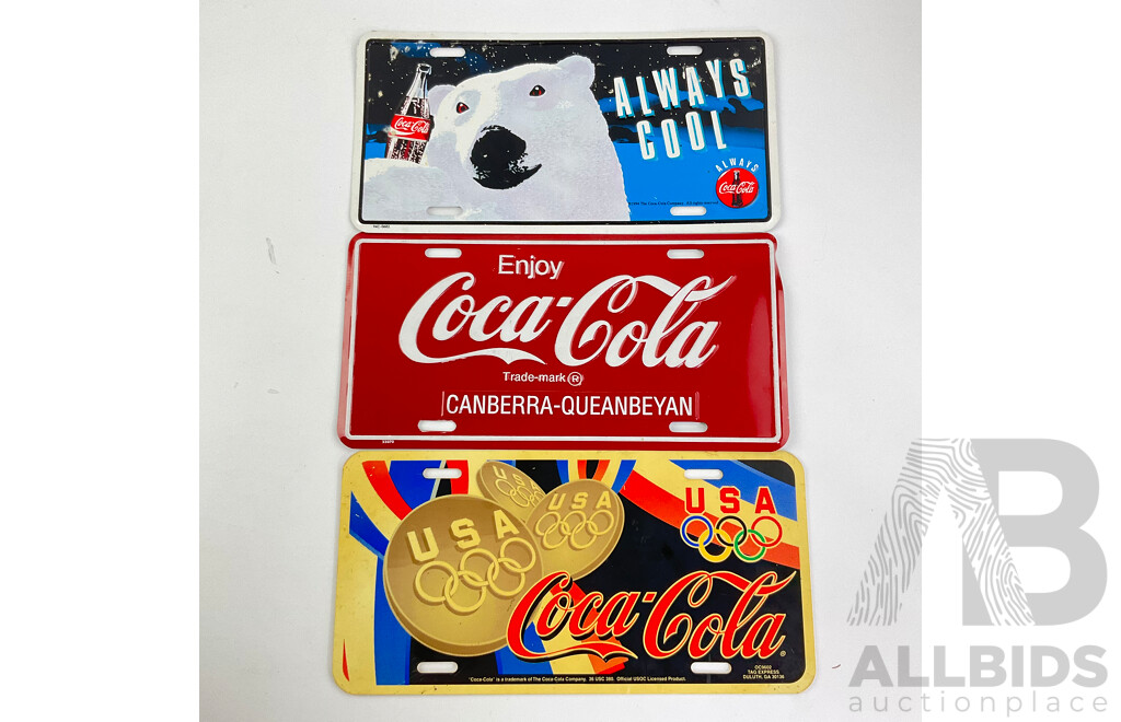 Collection of Vintage Coca Cola Number Plates Including Canberra-Queanbeyan, 1996 Atlanta Olympics, 1990's Always Cool, Sydney Olympics