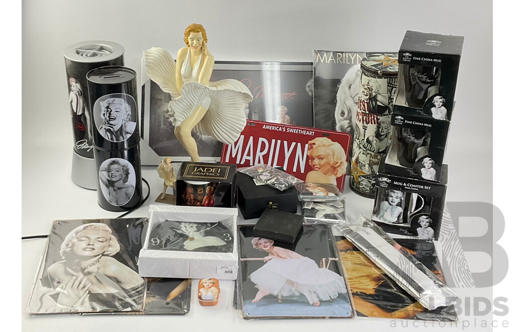 Collection of Marilyn Monroe Memorabilia Including Clock, Statue, Rotating Cylinder, Money Boxes, Cup, Coasters, Tin Plate Hangers, Picture, Calendar