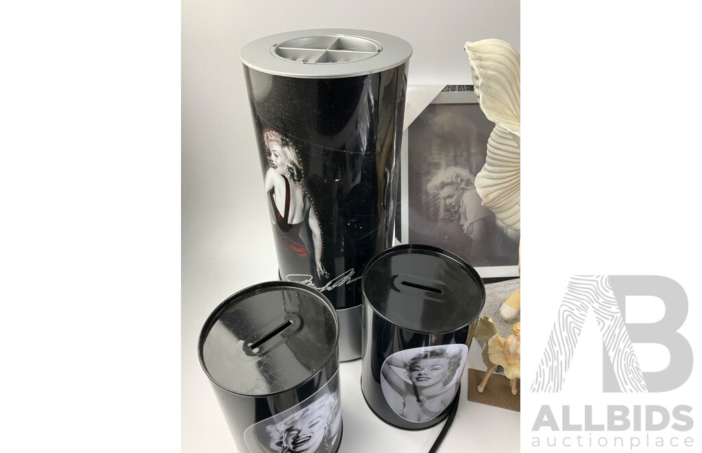 Collection of Marilyn Monroe Memorabilia Including Clock, Statue, Rotating Cylinder, Money Boxes, Cup, Coasters, Tin Plate Hangers, Picture, Calendar