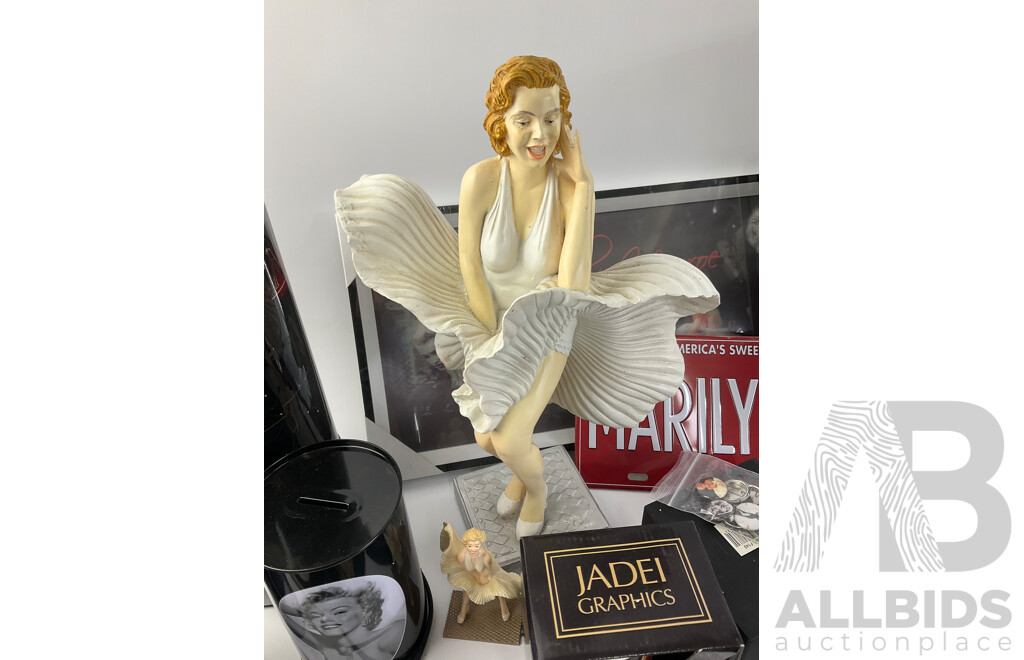 Collection of Marilyn Monroe Memorabilia Including Clock, Statue, Rotating Cylinder, Money Boxes, Cup, Coasters, Tin Plate Hangers, Picture, Calendar