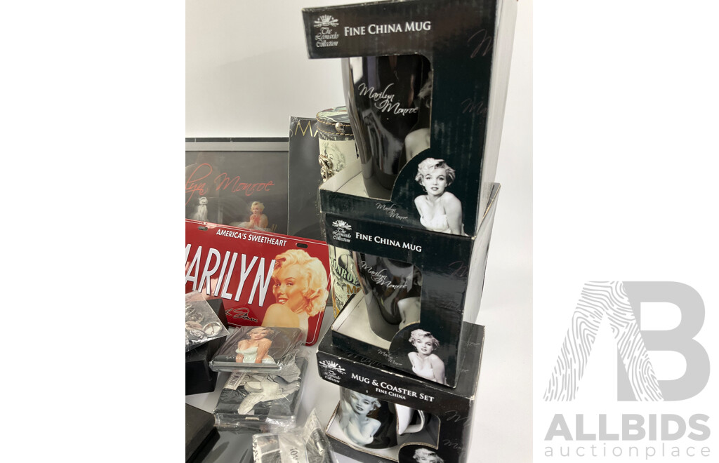 Collection of Marilyn Monroe Memorabilia Including Clock, Statue, Rotating Cylinder, Money Boxes, Cup, Coasters, Tin Plate Hangers, Picture, Calendar