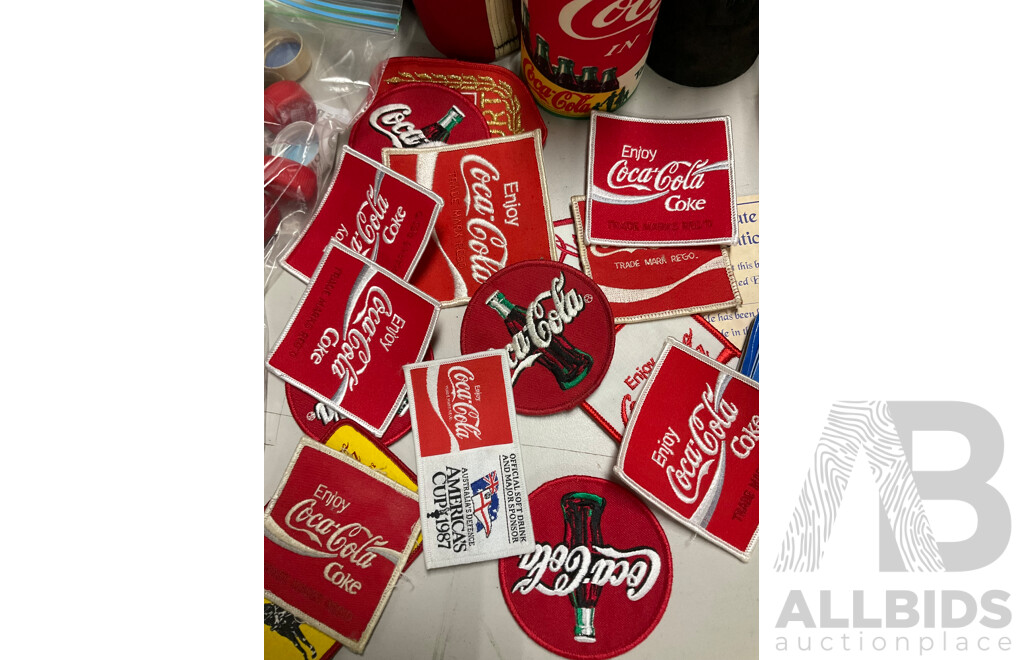 Selection of Coca Cola Merchandise Including Three Boxed Salt and Pepper Shakers, Vintage Sew on Patches and Bottle Openers, Stubbie Coolers, Mini Collector Bottles and More