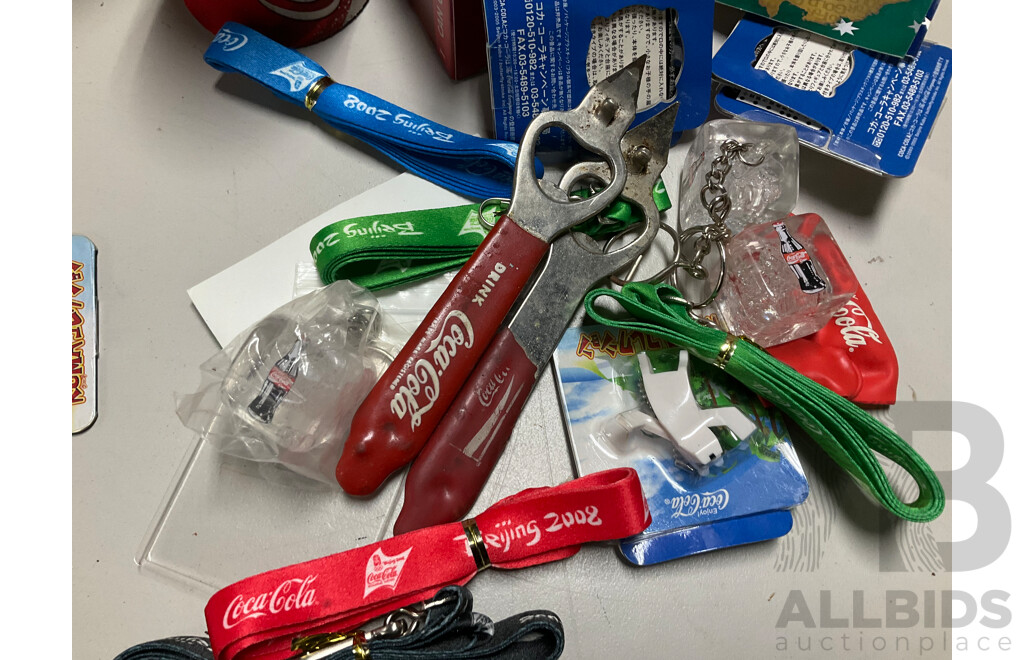 Selection of Coca Cola Merchandise Including Three Boxed Salt and Pepper Shakers, Vintage Sew on Patches and Bottle Openers, Stubbie Coolers, Mini Collector Bottles and More