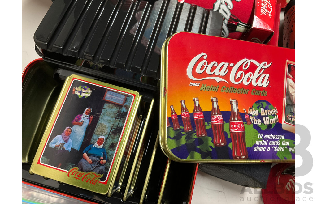 Selection of Coca Cola Merchandise Including Three Boxed Salt and Pepper Shakers, Vintage Sew on Patches and Bottle Openers, Stubbie Coolers, Mini Collector Bottles and More