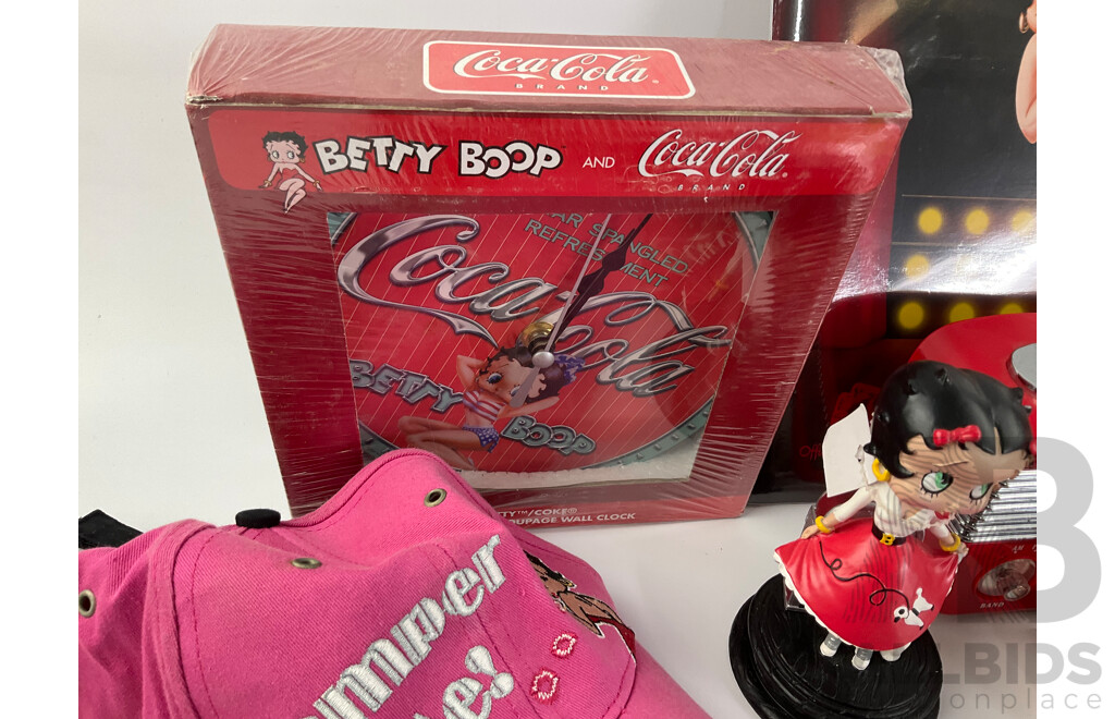 Betty Boop Merchandise Including AM/FM Radio, Wall and Table Clocks, Highball and Shot Glasses, Calendar, Tin Signs