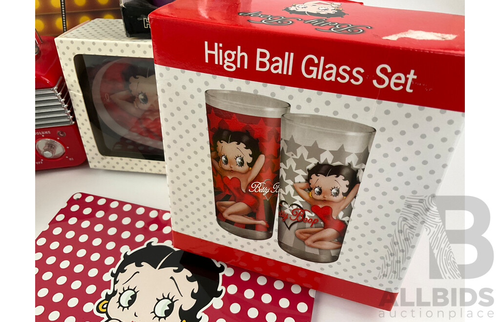 Betty Boop Merchandise Including AM/FM Radio, Wall and Table Clocks, Highball and Shot Glasses, Calendar, Tin Signs