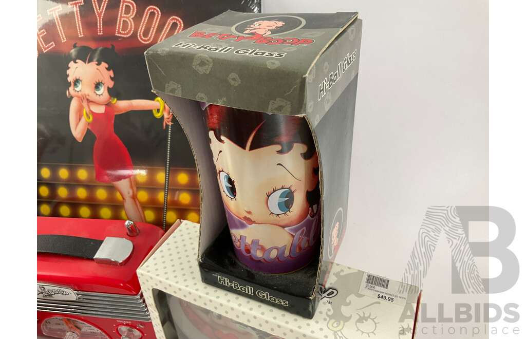 Betty Boop Merchandise Including AM/FM Radio, Wall and Table Clocks, Highball and Shot Glasses, Calendar, Tin Signs