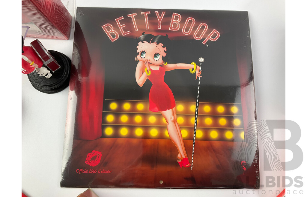 Betty Boop Merchandise Including AM/FM Radio, Wall and Table Clocks, Highball and Shot Glasses, Calendar, Tin Signs