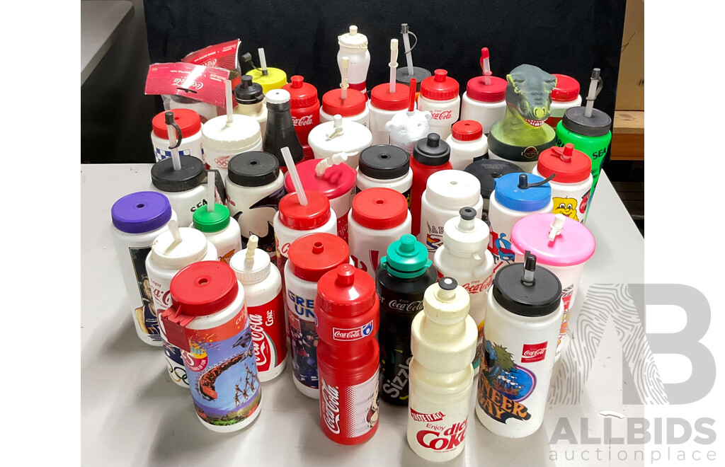 Collection of Vintage Coca Cola Water Bottles Including NBL Teams, Wildcats, 36ers, Cannons, Kings, Olympics, Mr Spudie, Bowling Pin and More