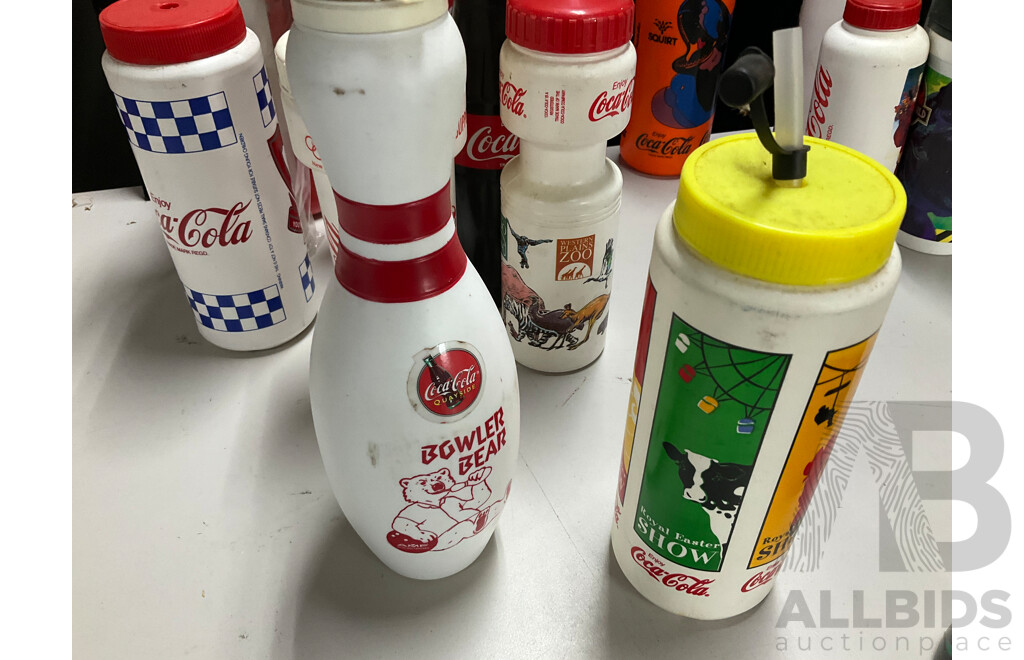 Collection of Vintage Coca Cola Water Bottles Including NBL Teams, Wildcats, 36ers, Cannons, Kings, Olympics, Mr Spudie, Bowling Pin and More
