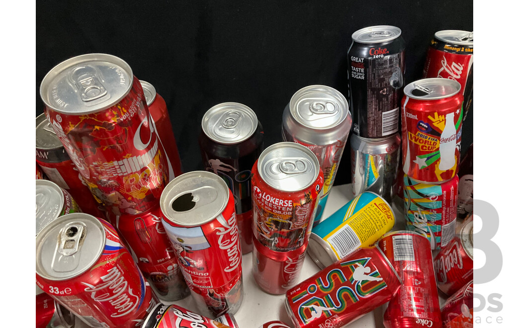 Large Collection of Commemorative and International Coca Cola Cans and Bottles Including Indy Car, Rugby, Olympics, Summer, Music Festivals and More