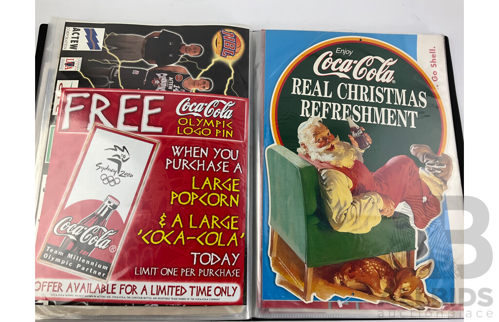 Album of Coca Cola Sporting Advertisements, Place Mats, Matchbox Brochures, Retail Signs and More