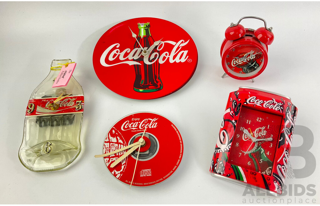 Collection of Coca Cola Wall and Desk Clocks Including Flat Bottle, Enameled and Traditional Alarm Clock