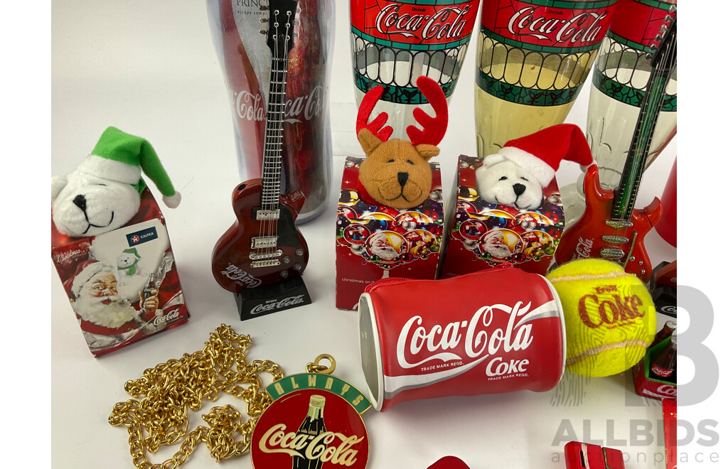 Collection of Coca Cola Collectables Including Cigarette Lighters, Cups, Christmas Ornaments and More