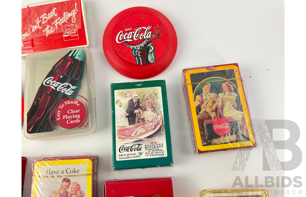 Collection of Vintage Coca Cola Cigarette Cases, Playing Cards, Coasters, Pens and Pencils