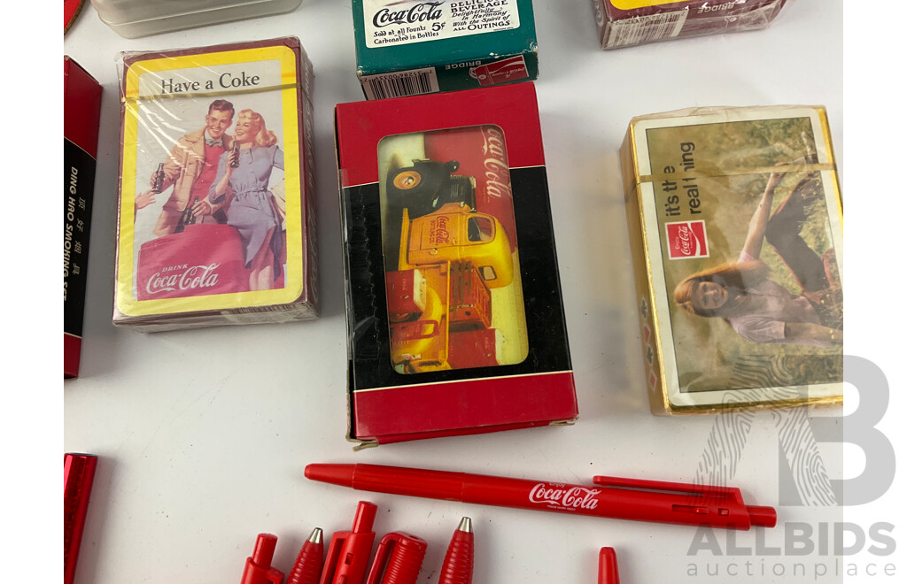 Collection of Vintage Coca Cola Cigarette Cases, Playing Cards, Coasters, Pens and Pencils