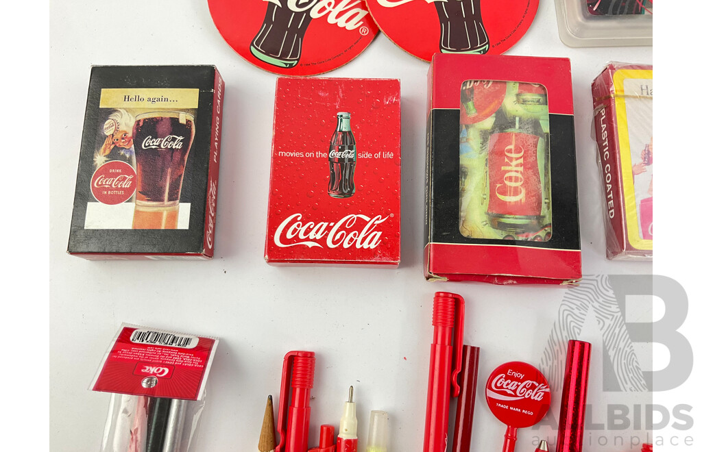 Collection of Vintage Coca Cola Cigarette Cases, Playing Cards, Coasters, Pens and Pencils