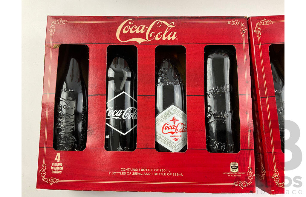 Collection of New and Old Coca Cola Bottles Including Tall Glass One Liter and Plastic T Shirt in a Bottle