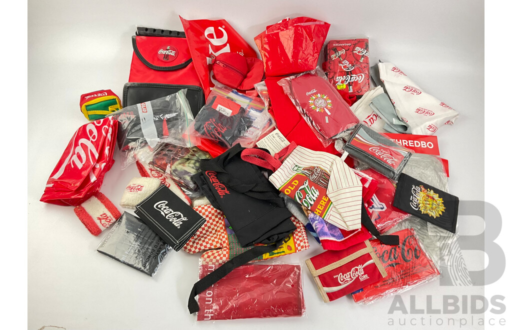 Assortment of Coca Cola Wallets, Tea Towels, Bags, Socks, Sweat Bands, Oven Mitt and Ponchos