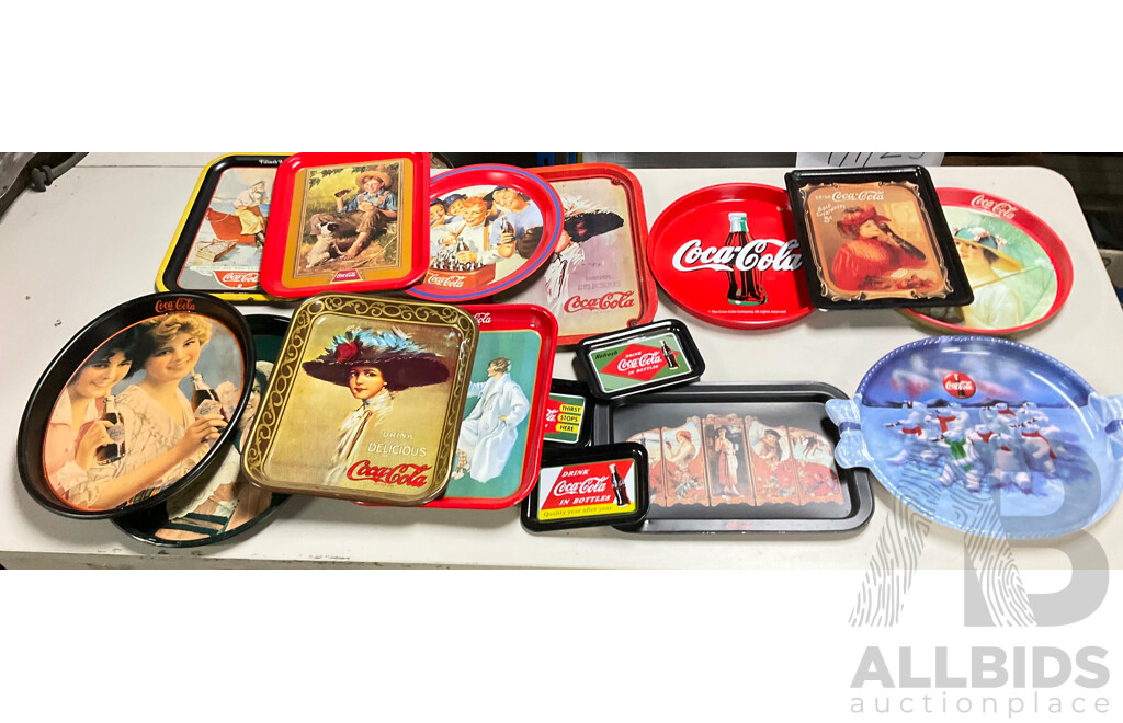 Sixteen Coca Cola Steel and Plastic Serving Trays Including Polar Bears and Classic Advertising