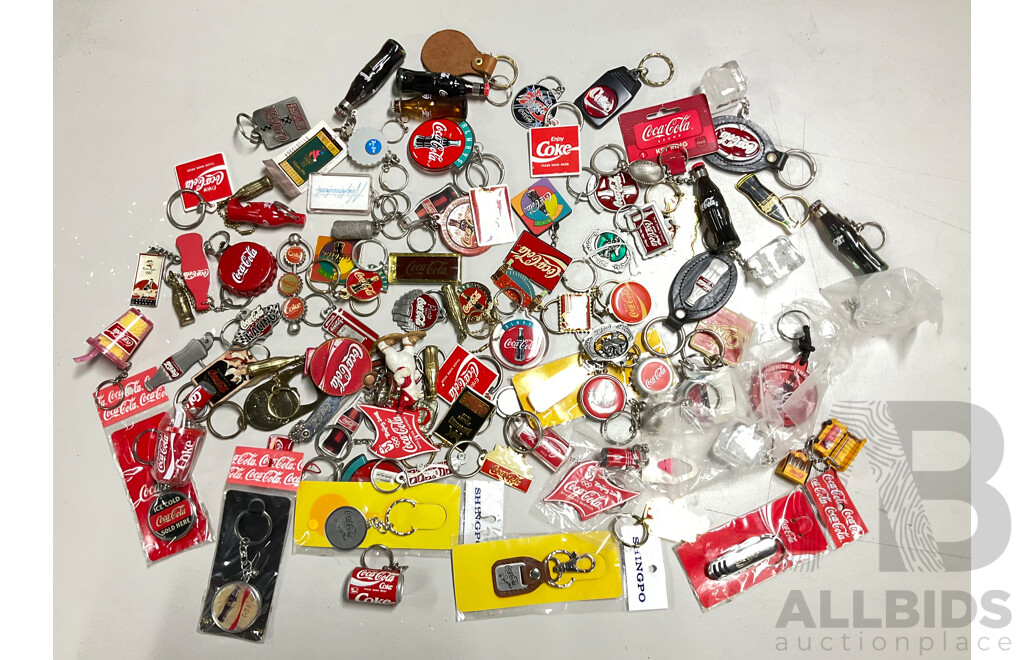 Collection of Coca Cola Keyrings Including NASCAR and Olympics