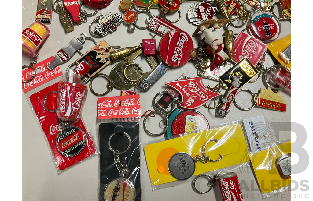 Collection of Coca Cola Keyrings Including NASCAR and Olympics