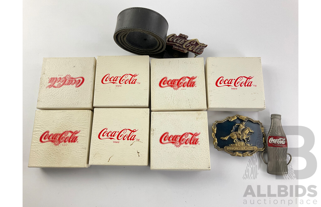 Collection of Coca Cola and Winchester Belt Buckles, Most with Certificates of Authenticity