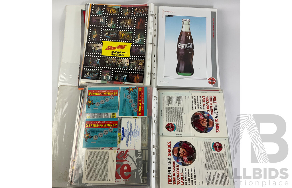 Two Albums of 1970's to 1990's Coca Cola Adverts and Promotional Material From Magazines, Sporting Programs, Music Events and More