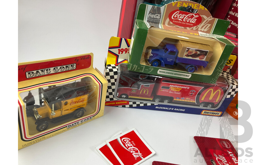 Assortment of Coca Cola Items Including Moulded Wall Clock, Bank Alarm Clock, Diecast Vehicles, Tins, Cups, Collector and Cooking Books