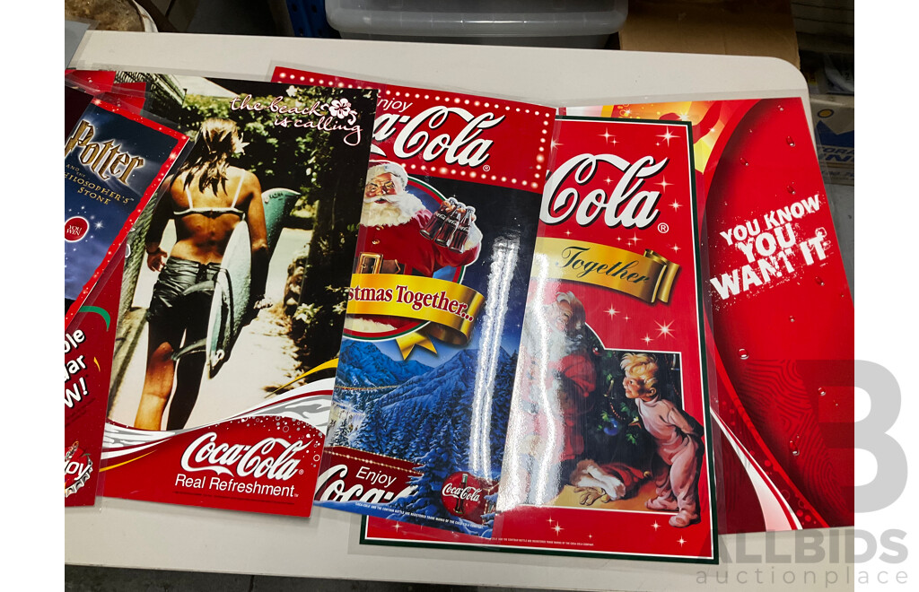 Twenty Laminated Coca Cola Retail Promotion/Advertisement Posters Including Christmas, Cherry Coke, Harry Potter, Beach is Calling and More