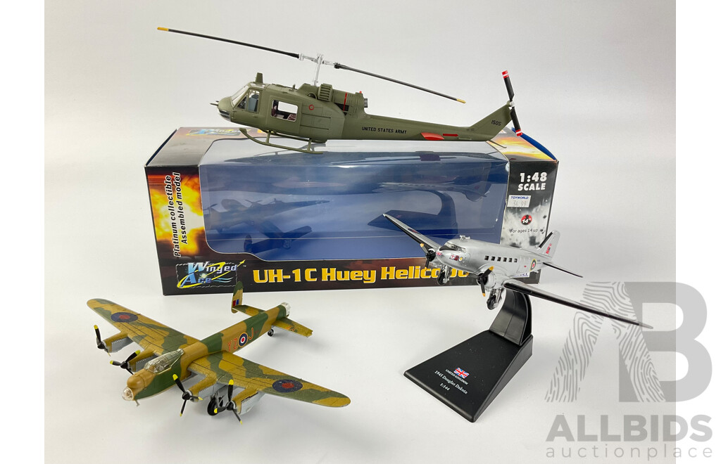 Diecast and Plastic Aircraft Including 1945 Douglas Dakota, Avro Lancaster BMKI and UH-1C Huey Helicopter