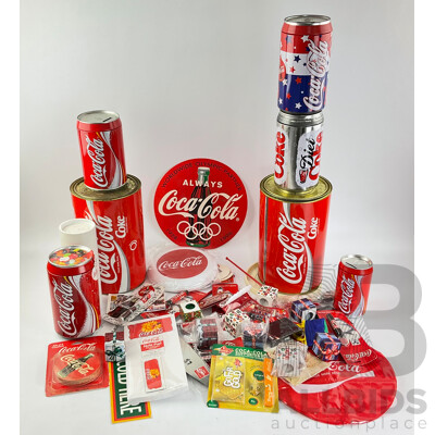 Coca Cola Merchandise Including Vintage Money Tins, Pens, Coasters, Frisbee, Playing Cards, Lip Smackers