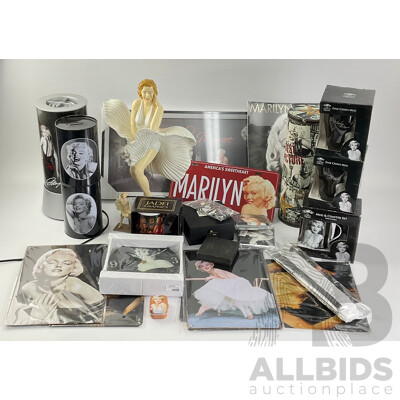 Collection of Marilyn Monroe Memorabilia Including Clock, Statue, Rotating Cylinder, Money Boxes, Cup, Coasters, Tin Plate Hangers, Picture, Calendar