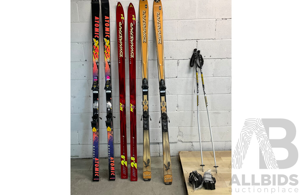 DYNASTAR,ATOMIC Ski Board & SCOTT Ski Poles & Revolutions Ski Boots Attachment