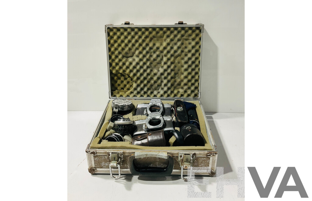 Pair of Vintage Minolta Cameras and Lenses in Weathered Case with Foam Insets