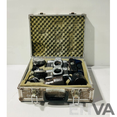 Pair of Vintage Minolta Cameras and Lenses in Weathered Case with Foam Insets
