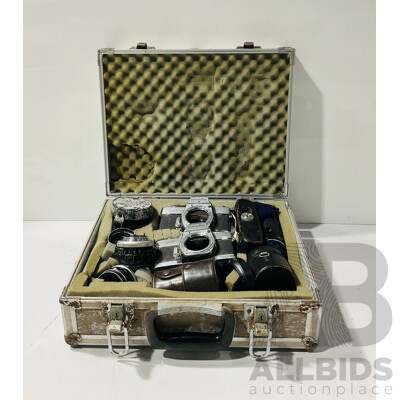 Pair of Vintage Minolta Cameras and Lenses in Weathered Case with Foam Insets