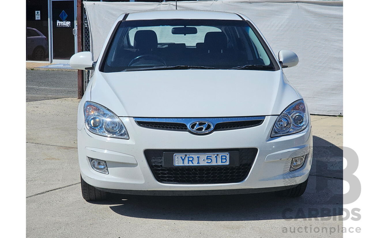 4/2010 Hyundai i30 SLX FD MY10 5d Hatchback White 2.0L