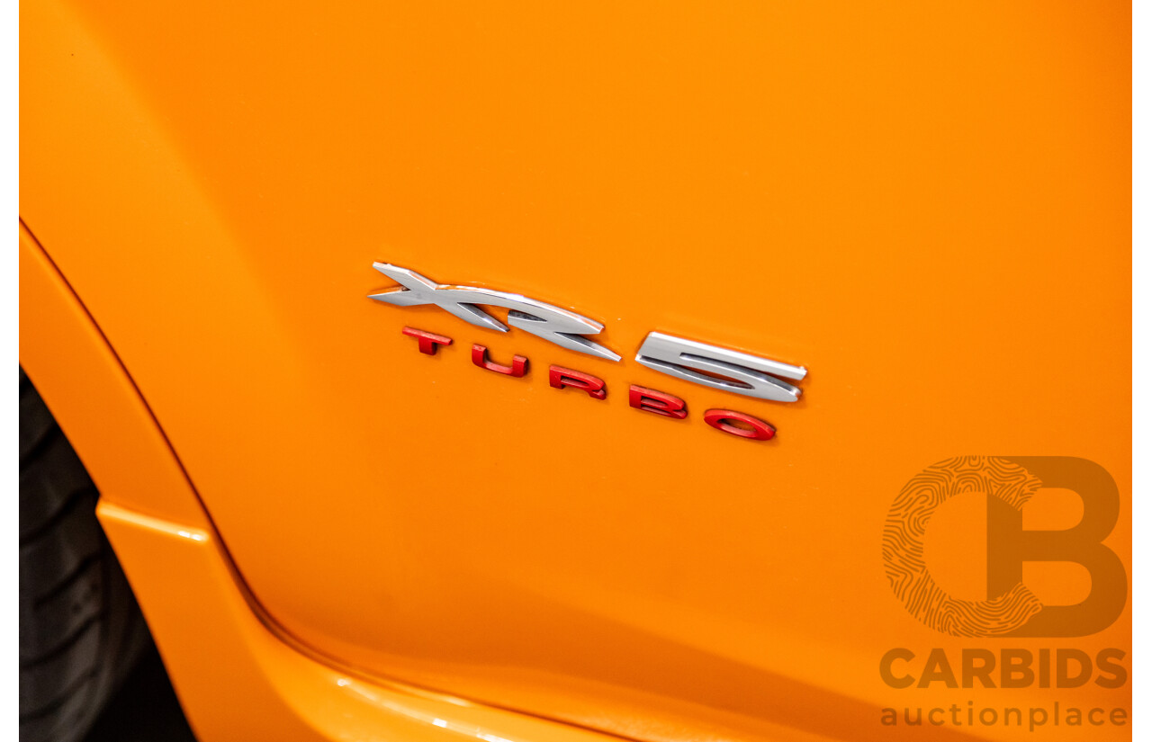 10/2010 Ford Focus XR5 Turbo LV 5d Hatchback Electric Orange 2.5L