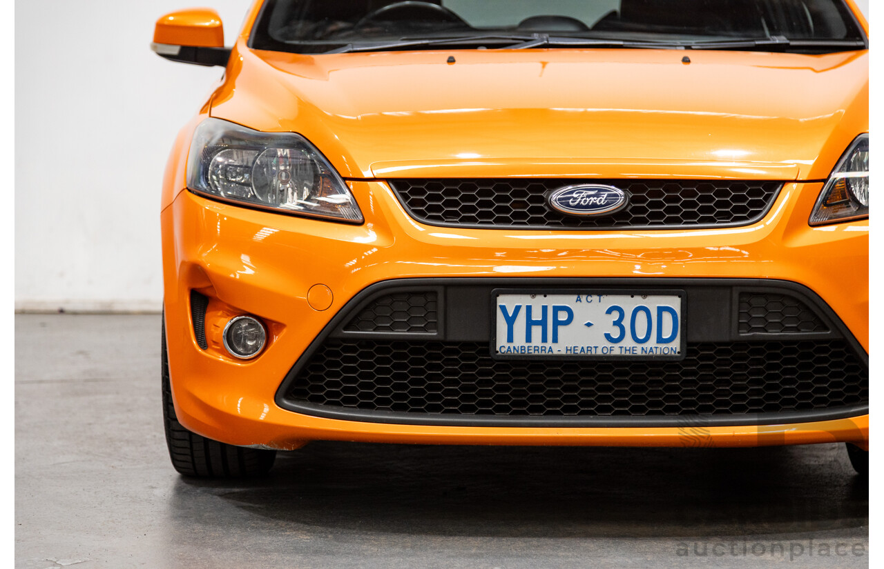 10/2010 Ford Focus XR5 Turbo LV 5d Hatchback Electric Orange 2.5L