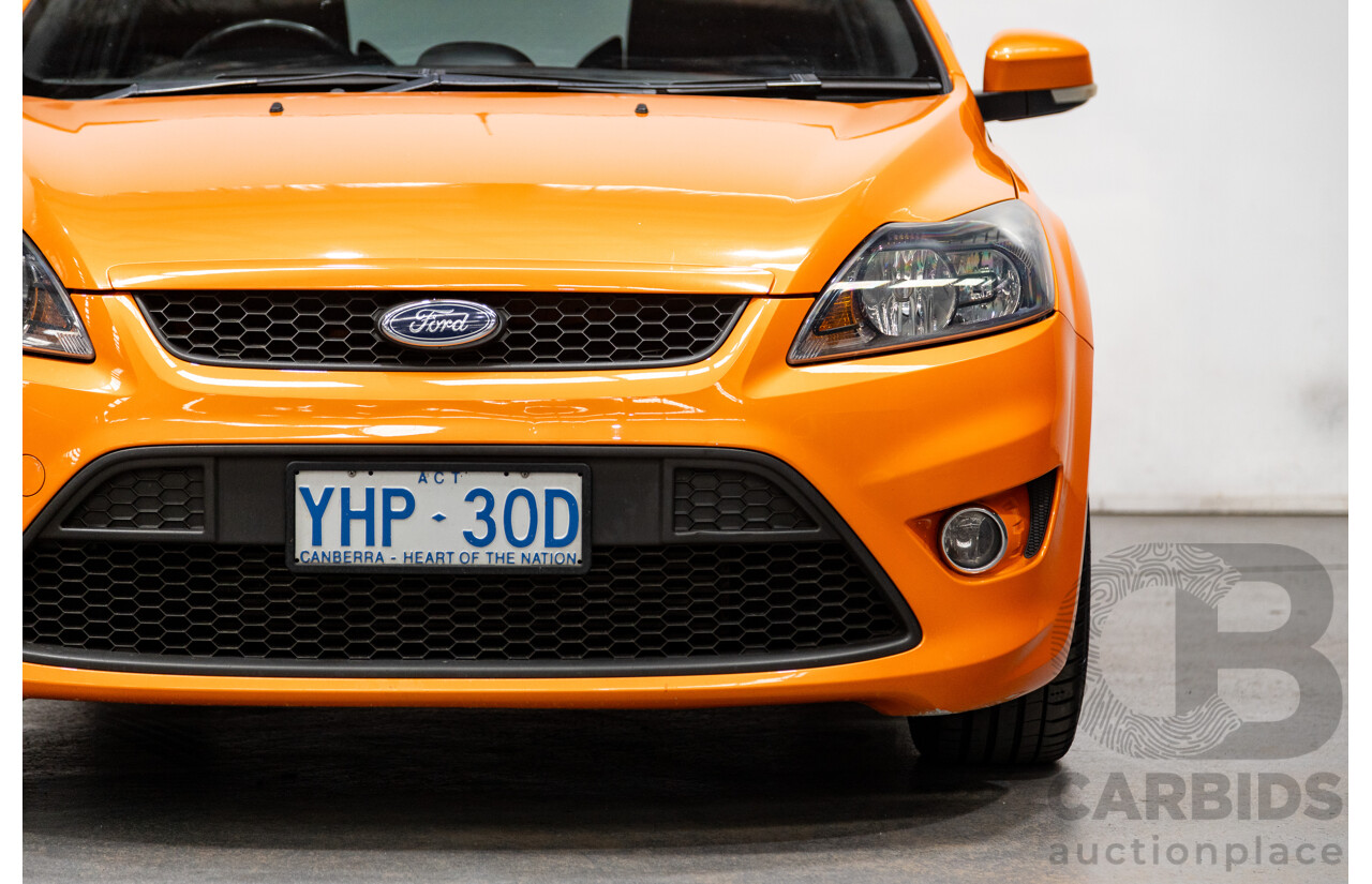 10/2010 Ford Focus XR5 Turbo LV 5d Hatchback Electric Orange 2.5L