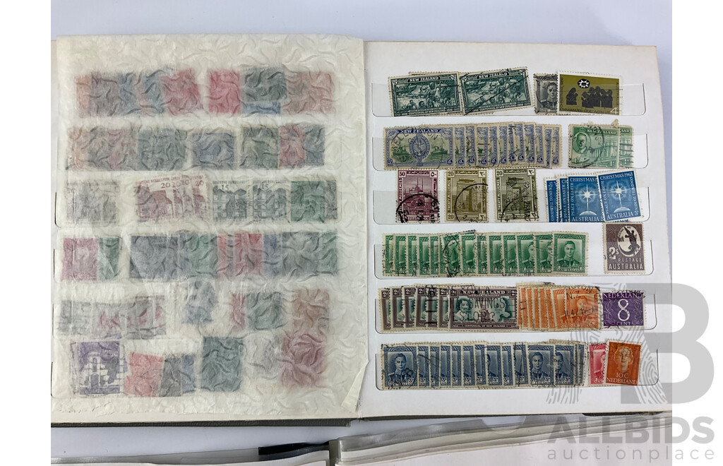 Two Albums of International Cancelled Stamps Including Australian and New Zealand Predecimal and Decimal, Red and Blue Harbour Bridge, Official Service, KGV, KGVI, QE2, USA, FIJI and More