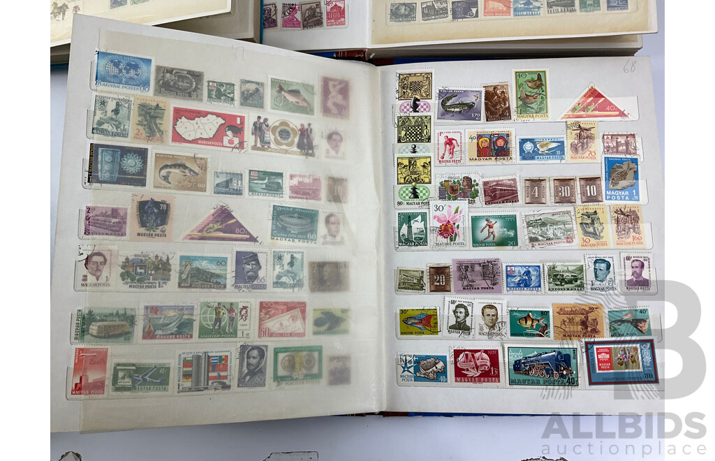 Four Albums of Vintage Mint and Cancelled Stamps Including USA, India, Fiji, Canada, Poland, Hungary, Malta, Eire, Dominica, Spain, Grenada, France, Italy, Romania and More