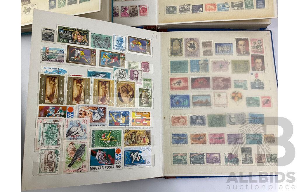 Four Albums of Vintage Mint and Cancelled Stamps Including USA, India, Fiji, Canada, Poland, Hungary, Malta, Eire, Dominica, Spain, Grenada, France, Italy, Romania and More