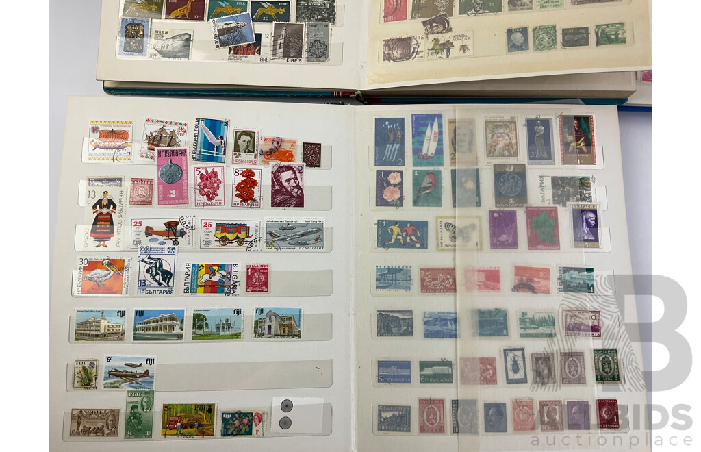 Four Albums of Vintage Mint and Cancelled Stamps Including USA, India, Fiji, Canada, Poland, Hungary, Malta, Eire, Dominica, Spain, Grenada, France, Italy, Romania and More