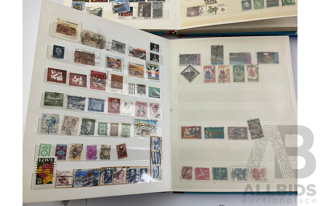 Four Albums of Vintage Mint and Cancelled Stamps Including USA, India, Fiji, Canada, Poland, Hungary, Malta, Eire, Dominica, Spain, Grenada, France, Italy, Romania and More