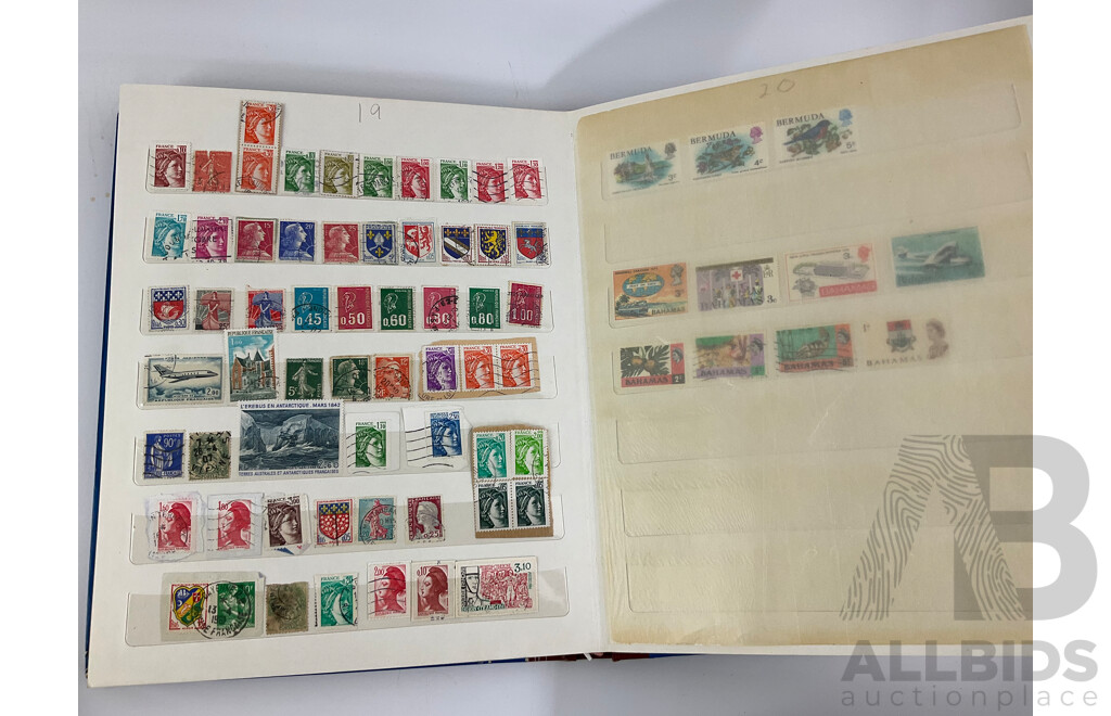 Four Albums of Vintage Mint and Cancelled Stamps Including USA, India, Fiji, Canada, Poland, Hungary, Malta, Eire, Dominica, Spain, Grenada, France, Italy, Romania and More